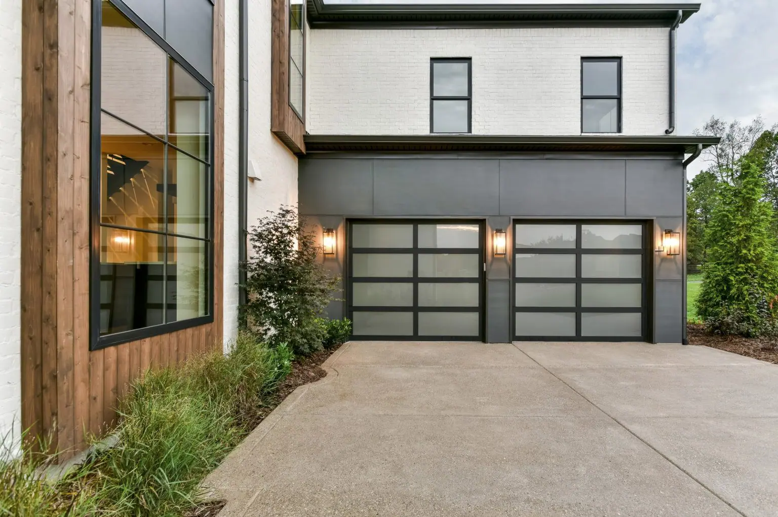 Modern glass-panel garage door installation in Austin TX